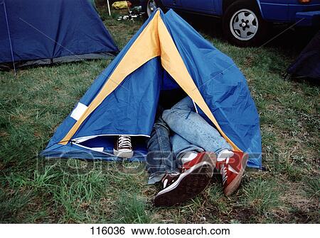 Two people in a tent View Large Photo Image Stock Photograph - Two people in a tent. Fotosearch