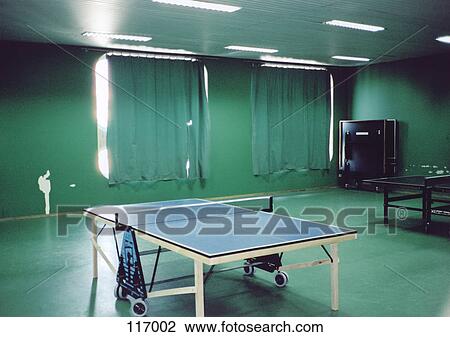 Stock Image - Table tennis in game room. Fotosearch