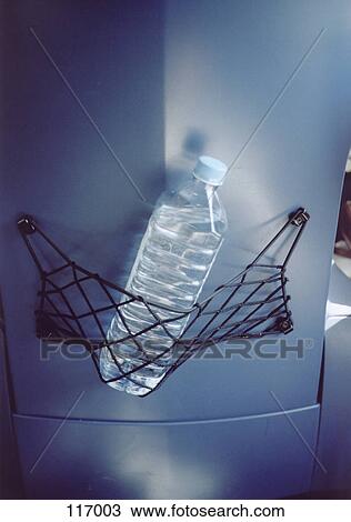 Water bottle in seat holder View Large Photo Image Stock Image - Water bottle in seat holder. Fotosearch