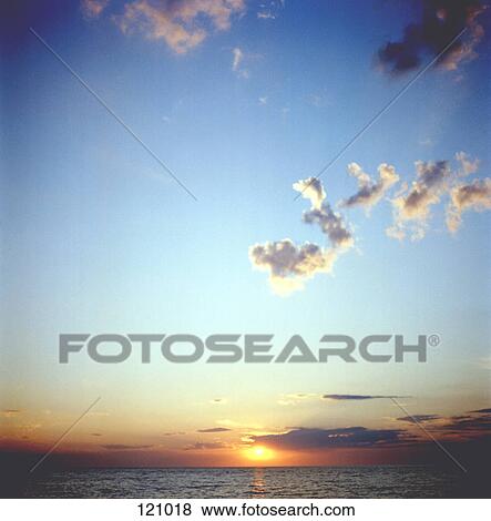 Sunset over ocean View Large Photo Image Stock Photo - Sunset over ocean. Fotosearch