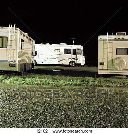 Three trailers in a parking lot View Large Photo Image Stock Image - Three trailers in a parking lot. Fotosearch