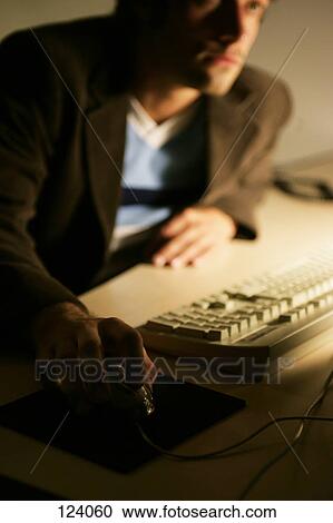 Man using a computer mouse View Large Photo Image Stock Image - Man using a computer mouse. Fotosearch