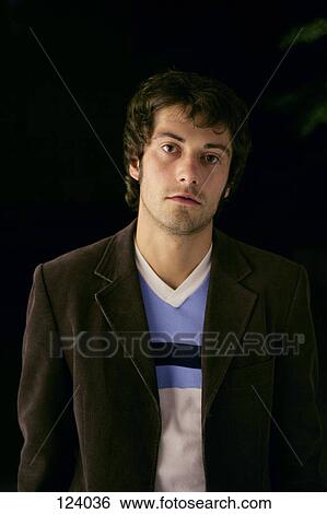 Portrait of man wearing a brown jacket View Large Photo Image Stock Photograph - Portrait of man wearing a brown jacket. Fotosearch
