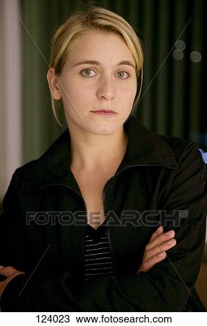 Portrait of woman wearing a black jacket View Large Photo Image Stock Image - Portrait of woman wearing a black jacket. Fotosearch