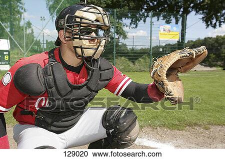 A baseball catcher at home plate View Large Photo Image Stock Image - A baseball catcher at home plate. Fotosearch