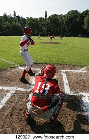 A baseball player at bat View Large Photo Image Stock Photo - A baseball player at bat. Fotosearch