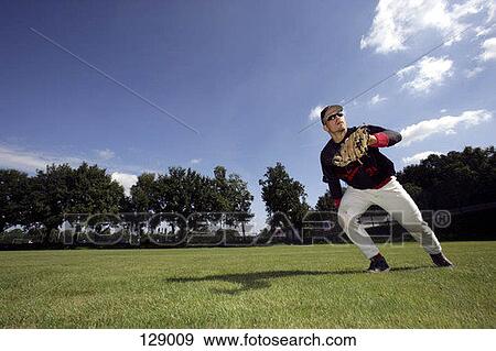 An outfielder waiting to catch a baseball View Large Photo Image Stock Photo - An outfielder waiting to catch a baseball. Fotosearch