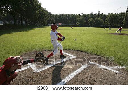 Baseball player swinging a bat View Large Photo Image Stock Image - Baseball player swinging a bat. Fotosearch