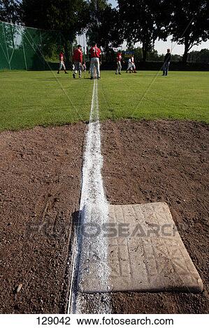Baseball team on a field View Large Photo Image Stock Image - Baseball team on a field. Fotosearch