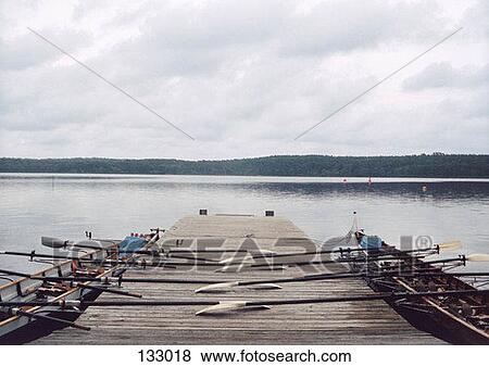 Stock Photo - Two row boats at a dock. Fotosearch