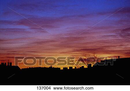 Urban skyline with orange sky View Large Photo Image Picture - Urban skyline with orange sky. Fotosearch