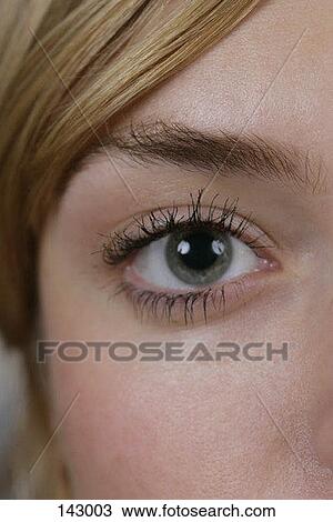 Stock Image - Close up of a woman's face. Fotosearch