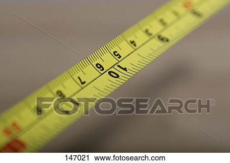 Close up of a measuring tape View Large Photo Image Stock Image - Close up of a measuring tape. Fotosearch
