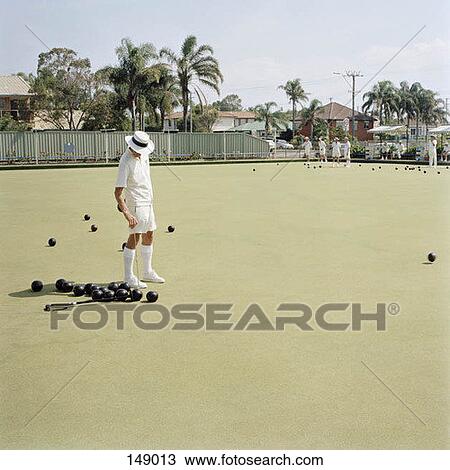 An old man hurling a bocce ball View Large Photo Image Stock Image - An old man hurling a bocce ball. Fotosearch