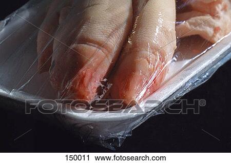 Close up of pig's feet wrapped in plastic View Large Photo Image Stock Image - Close up of pig's feet wrapped in plastic. Fotosearch
