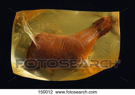 Top view of a piece of chicken packed in plastic View Large Photo Image Stock Image - Top view of a piece of chicken packed in plastic. Fotosearch