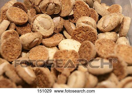 A group of small brown cookies View Large Photo Image Stock Photo - A group of small brown cookies. Fotosearch