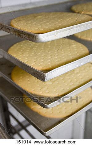 Unbaked dough on a tray View Large Photo Image Picture - Unbaked dough on a tray. Fotosearch