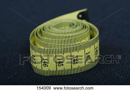 Close up of a measuring tape View Large Photo Image Stock Photo - Close up of a measuring tape. Fotosearch