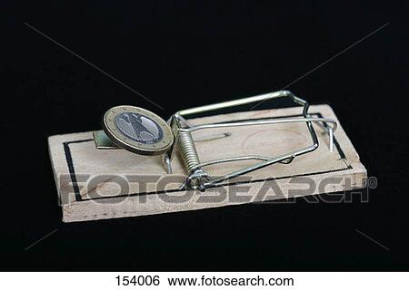 Close up of a mousetrap on a black surface View Large Photo Image Stock Photograph - Close up of a mousetrap on a black surface. Fotosearch