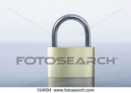 Front view of a small lock on a shiny surface View Large Photo Image Picture - Front view of a small lock on a shiny surface. Fotosearch