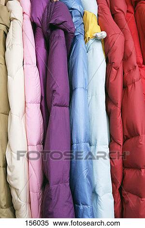 Front view of colorful jackets on a clothing rack View Large Photo Image Stock Photography - Front view of colorful jackets on a clothing rack. Fotosearch
