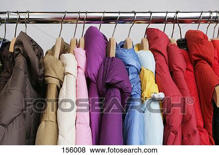 Numerous colorful jackets on a rack View Large Photo Image Stock Photo - Numerous colorful jackets on a rack. Fotosearch