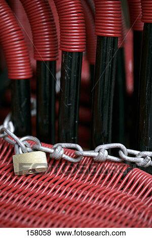 Chairs locked together View Large Photo Image Stock Photo - Chairs locked together. Fotosearch