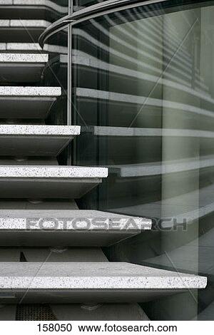 Close up of a staircase and its reflection on glass View Large Photo Image Stock Image - Close up of a staircase and its reflection on glass. Fotosearch