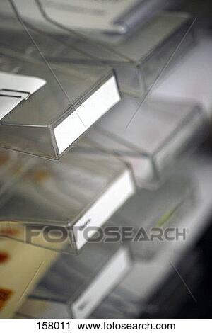 High angle view of an inbox trays with names labeling each tray View Large Photo Image Stock Image - High angle view of an inbox trays with names labeling each tray. Fotosearch