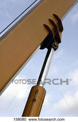 Low angle view of shock absorbers supporting a huge beam of a crane View Large Photo Image Stock Image - Low angle view of shock absorbers supporting a huge beam of a crane. Fotosearch