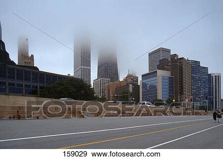 Stock Photo - Downtown Chicago, USA, in fog. Fotosearch