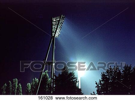 Stadium lighting at night View Large Photo Image Stock Photo - Stadium lighting at night. Fotosearch