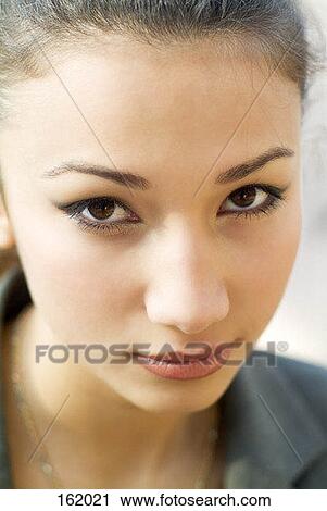 Stock Image - Portrait of a young girl. Fotosearch