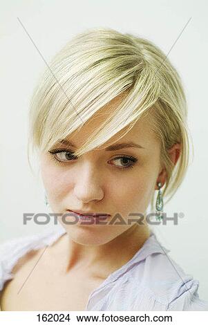 Portrait of a young woman View Large Photo Image Picture - Portrait of a young woman. Fotosearch