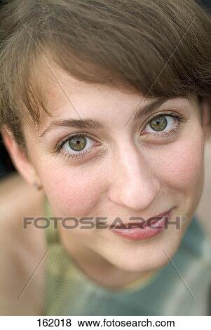 Portrait of a young woman View Large Photo Image Stock Photo - Portrait of a young woman. Fotosearch