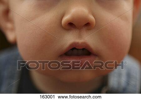 Close up of a baby's face View Large Photo Image Stock Image - Close up of a baby's face. Fotosearch