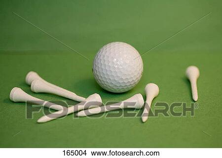 A golf ball with golf tees View Large Photo Image Picture - A golf ball with golf tees. Fotosearch