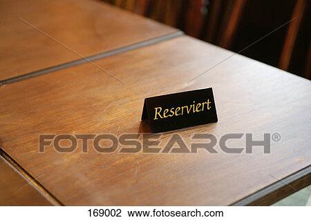 High angle view of a reserved table in a restaurant View Large Photo Image Stock Image - High angle view of a reserved table in a restaurant. Fotosearch