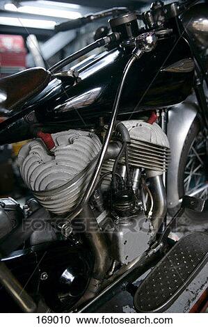 Side view of the engine of an antique motorcycle View Large Photo Image Stock Image - Side view of the engine of an antique motorcycle. Fotosearch