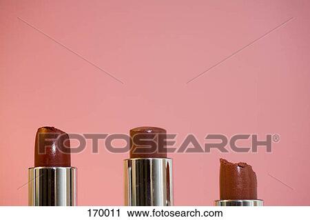 Three tubes of lipstick View Large Photo Image Stock Image - Three tubes of lipstick. Fotosearch