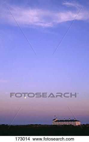 Picture - A building in a rural landscape. Fotosearch