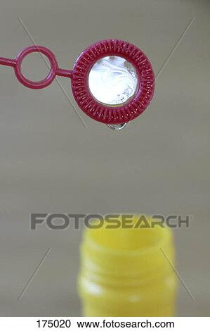 A bubble wand and bottle View Large Photo Image Stock Image - A bubble wand and bottle. Fotosearch