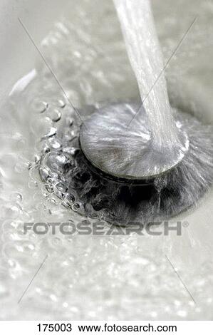 Water pouring into a drain View Large Photo Image Stock Image - Water pouring into a drain. Fotosearch