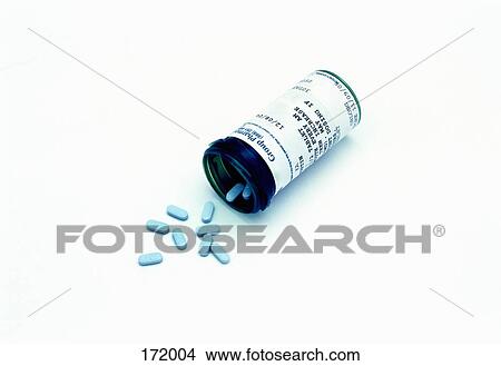 Pill bottle knocked over View Large Photo Image Picture - Pill bottle knocked over. Fotosearch