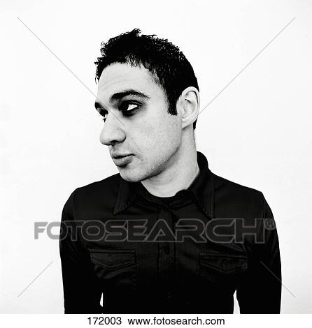 Young man looking sideways View Large Photo Image Stock Image - Young man looking sideways. Fotosearch