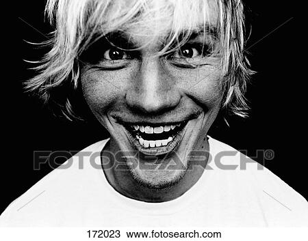 Young man smiling View Large Photo Image Stock Image - Young man smiling. Fotosearch