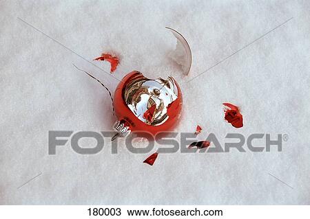 Close-up of shattered Christmas decoration in snow View Large Photo Image Stock Image - Close-up of shattered Christmas decoration in snow. Fotosearch