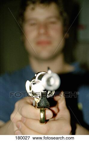 Man aiming handgun View Large Photo Image Stock Photo - Man aiming handgun. Fotosearch