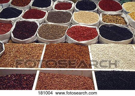 Picture - Dried beans arranged in sacks and trays. Fotosearch